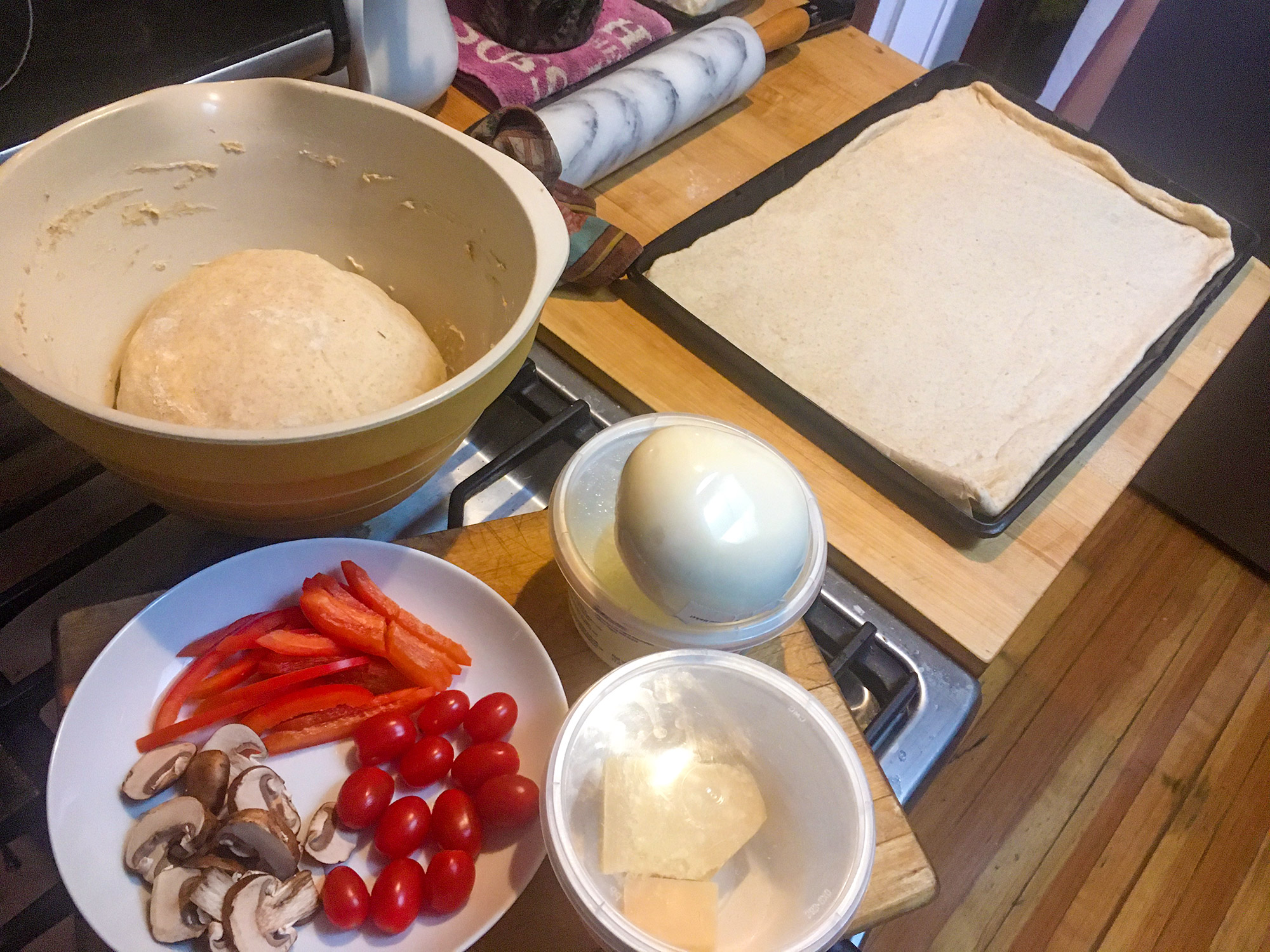 Pizza ingredients and remaining dough