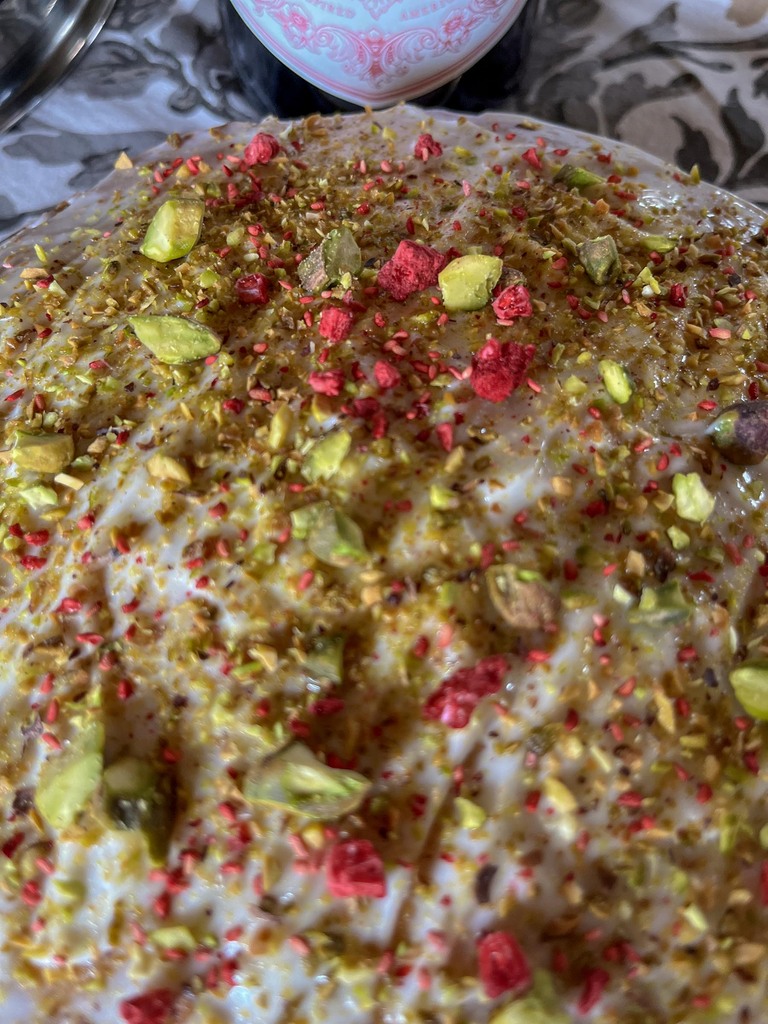 Detail of pistacho raspberry cake decoration